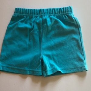 Kidgets 3/6M Blue shorts with a pair of blue socks